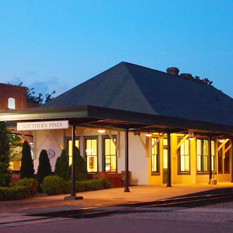 Night view of the Southern Pines depot.