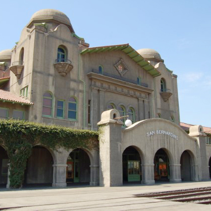 Trackside view of the San Bernardino depot showing two domed towers.