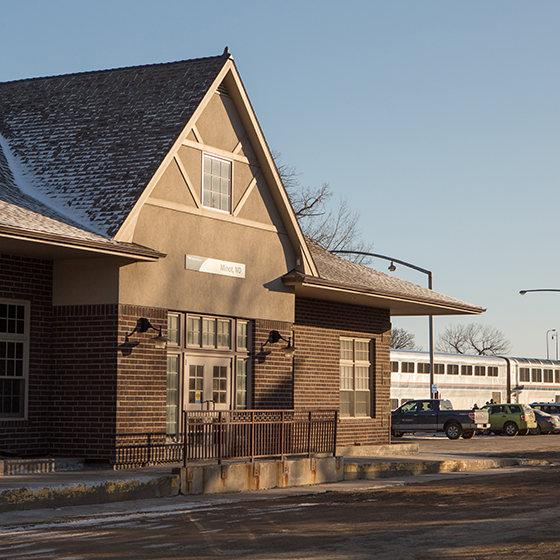 View of the Minot depot with the Empire Builder in the background.