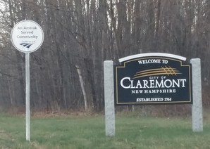 New community signage (left) highlights Amtrak service.