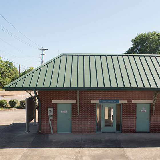 The Lake Charles, La., station is red brick with a hipped roof.