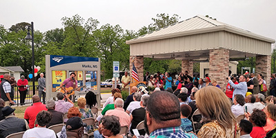 A crowd gathers for the dedication of the new Marks, Miss., station.