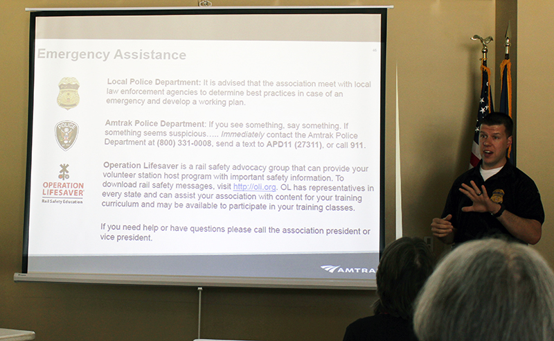 Amtrak detective talks to crowd about rail safety.
