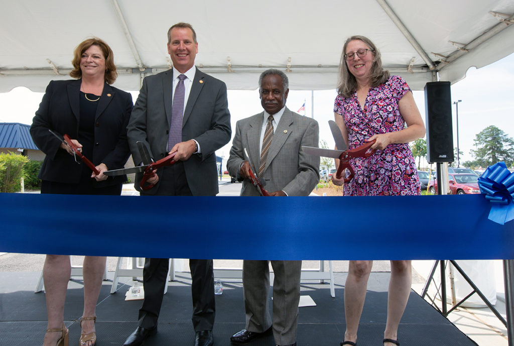 State, local and Amtrak dignitaries cut the ribbon to celebrate the new parking spaces at the Richmond Staples Mill Station.