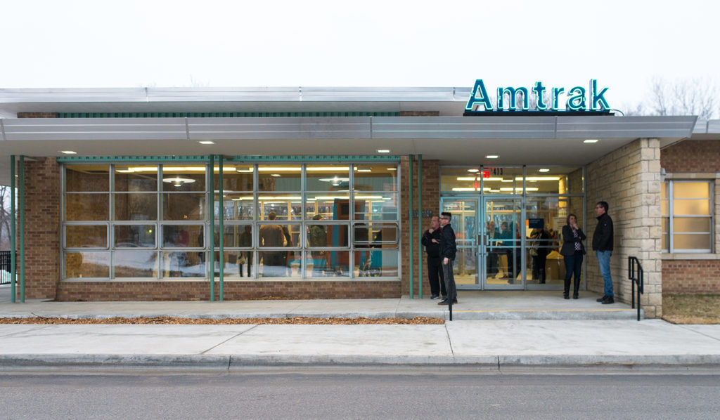 People standing in front of the Lawrence depot.