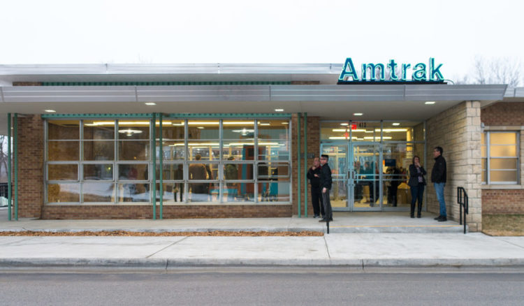 People standing in front of the Lawrence depot.