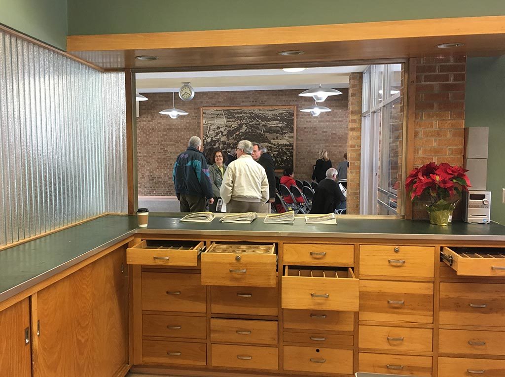 View of a ticket counter showing open drawers.