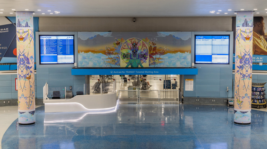 View of colorful artwork in a train station.