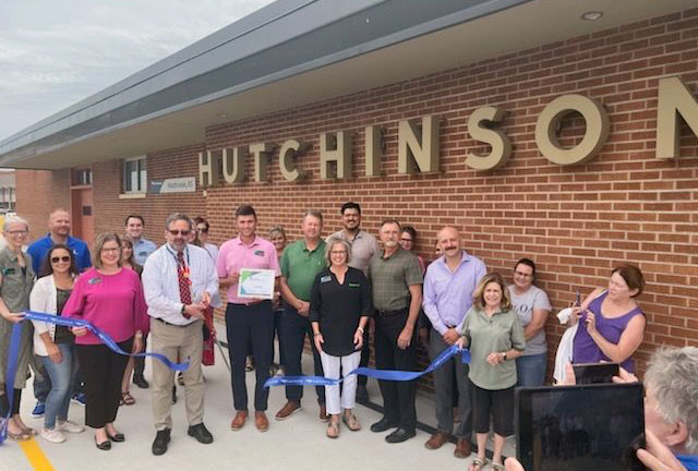 A crowd celebrates at the Hutchinson, Kansas, Amtrak station.